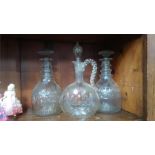 Pair of three ring decanters and one other