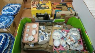 Two toy sewing machines etc.