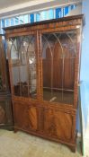 A reproduction mahogany bookcase