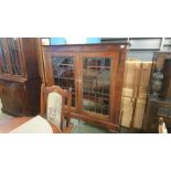 A leaded glass bookcase