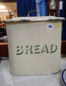 An enamel bread tin