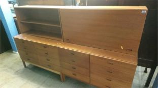 Two double teak chest of drawers and two wall cabinets (4)