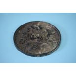 A good quality bronze Chinese hand mirror. 11cm diameter