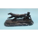 A reproduction bronze of two dogs hunting