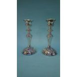 A pair of silver candlesticks