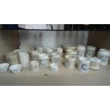 Quantity of jelly moulds and Maling advertising pots