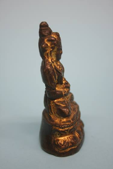 A small gilt bronze Buddha. 8cm high - Image 3 of 7