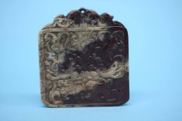 A finely carved Chinese jade pendant. 5cm wide