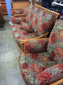 An Ercol Colonial three piece suite