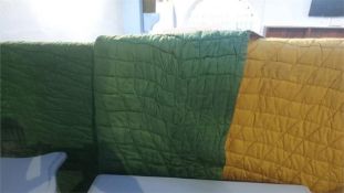An orange and green Durham quilt