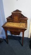 An Edwardian rosewood and inlaid Ladies writing desk and sewing table, the single drawer opening