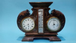 A carved oak compendium clock/barometer, Goldsmith and Co Newcastle Upon Tyne, 31cm width, 24cm