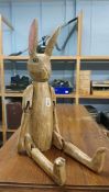 A wooden articulated rabbit