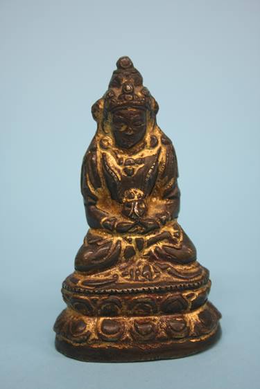A small gilt bronze Buddha. 8cm high - Image 2 of 7