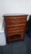 A mahogany music chest