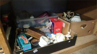 Three boxes of assorted tea pots and figures etc.