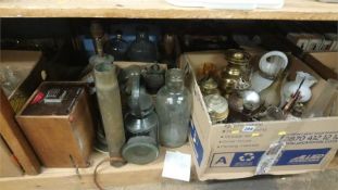 Shelf of assorted, Shell brass lamp and oil lamps etc.