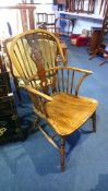 A stick back Windsor chair