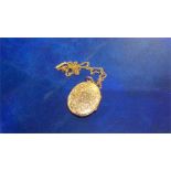 A 9ct gold oval locket with chain, weight 10.3 grams