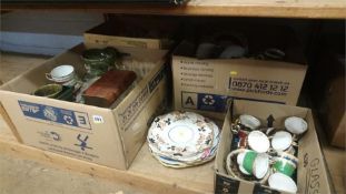 Four boxes of china, glass and tea sets etc.