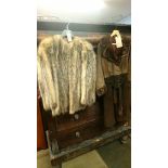 A Possum skin coat and another