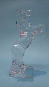 A Daum of France clear glass model of a rearing horse, etched Daum France, 34cm height