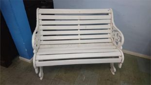 A Victorian cast iron two seater garden bench
