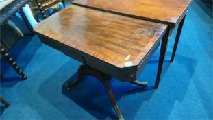 A 19th century mahogany fold over card table, 89cm wide