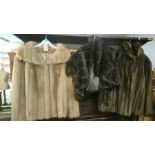Three fake fur coats