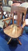 An oak swivel office chair