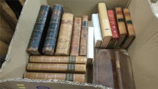A box of leather bound books