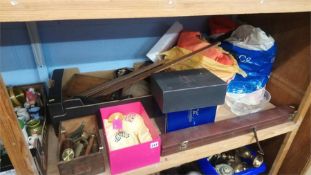 Shelf of assorted, snooker cue, clothes and life jacket etc.