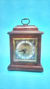 A walnut cased Elliott of London clock for Garrard and Co Limited, 112 Regent Street London, 19cm
