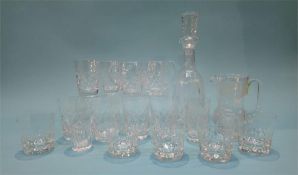 A Waterford crystal decanter, an Edinburgh crystal 'thistle' water jug and a quantity of glasses