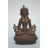 A bronze figure of a Buddha. 16cm high