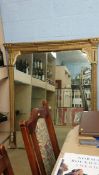 A gilt overmantle mirror, 125cm wide, 145cm high