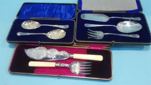 Cased silver plated fish servers etc.