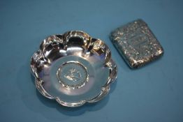 An engraved silver vesta case and a small silver dish