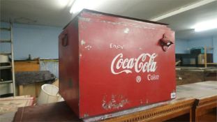 A Coca Cola cool box