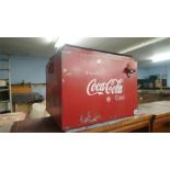 A Coca Cola cool box