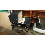 A Silver Cross dolls pram