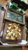 Box of collectable spoons, clocks and dog figures