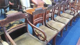 A set of six 19th century mahogany dining chairs, comprising four singles and two carvers