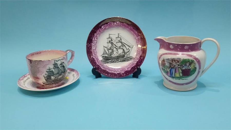 A Sunderland purple lustre 'Sailors Farewell' jug, a Staffordshire lustre ware cup and saucer etc.