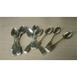 A collection of silver spoons