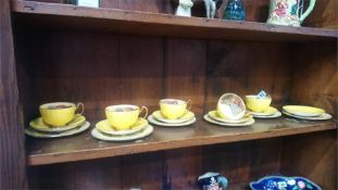 Quantity of Aynsley Orchard Gold tea china