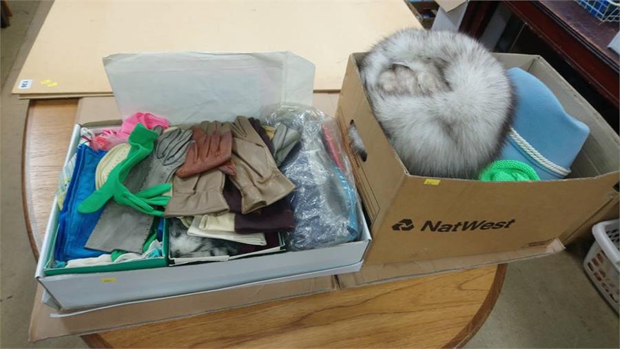 Quantity of gloves and hats in two boxes