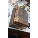 Family bible and a leather bound photo album