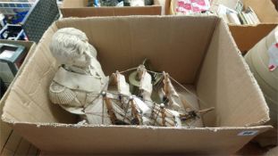 Box of assorted including a model ship