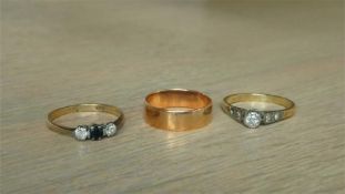 Two 9ct gold rings and one stamped 18ct (3)